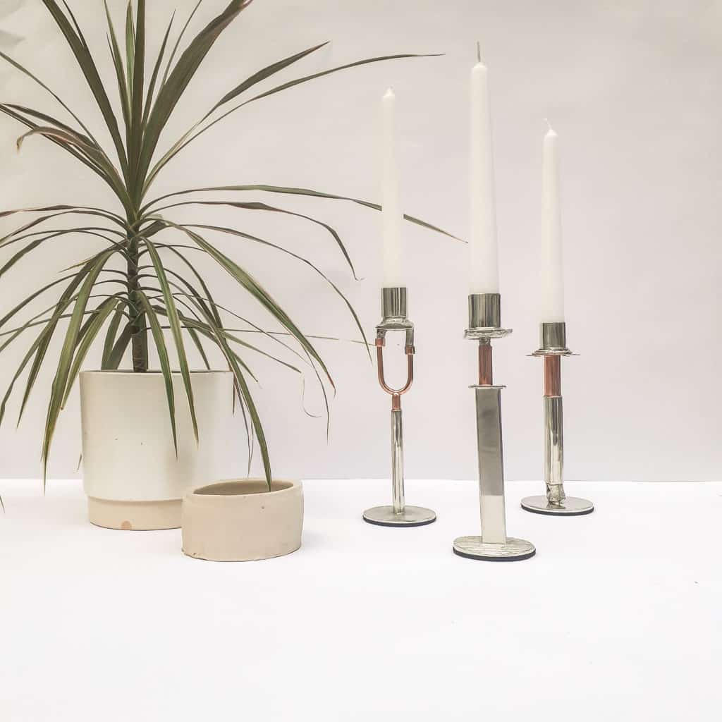 Pewter and copper candlesticks