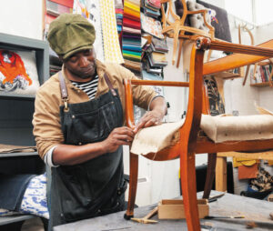 Ray Clarke, upholsterer, photo by Jo Sealy as part of the Black Artisans project