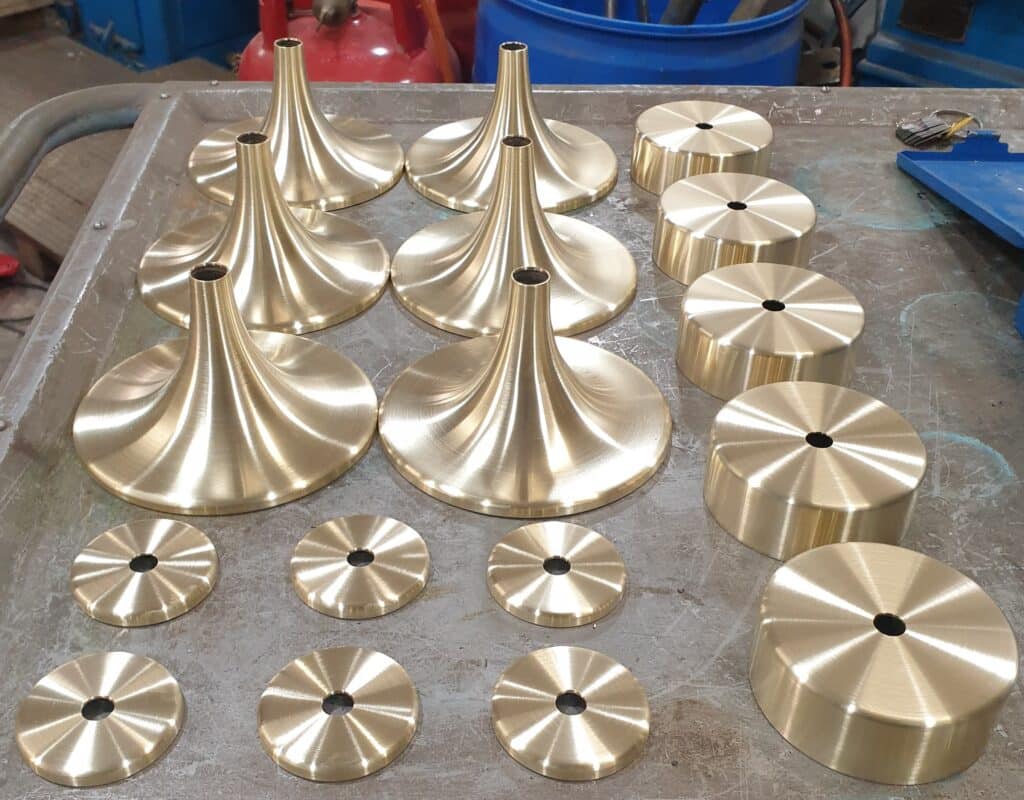 Brass lighting components