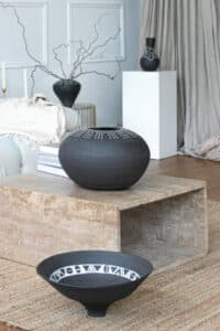 Black and white vessels in home interior