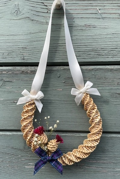 horseshoe with thistles