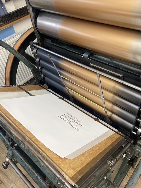 Printing the programme for the Oxford University Society of Bibliophiles