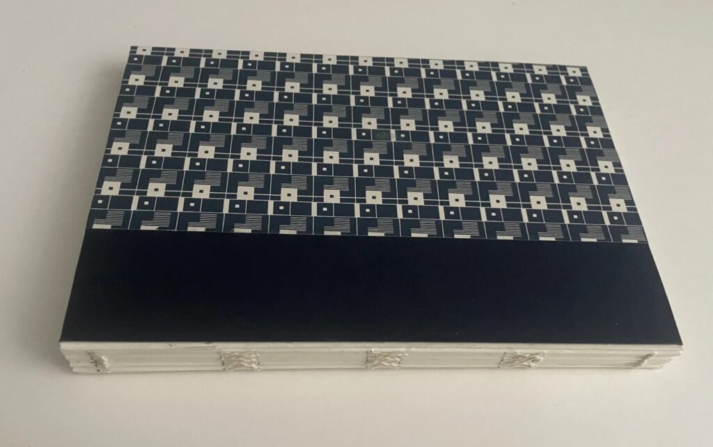 Desk Book – Exposed sewing with lay-flat binding.