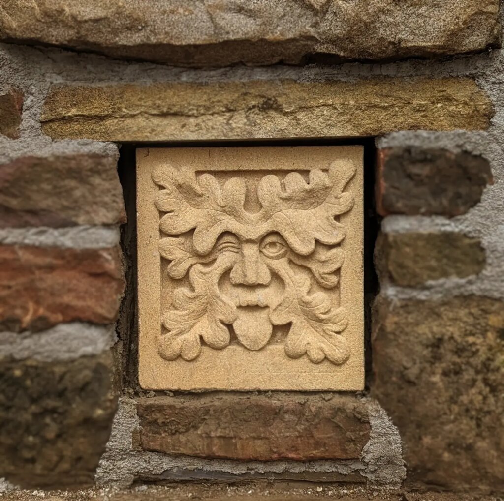 Foliate Head carved in Bath stone