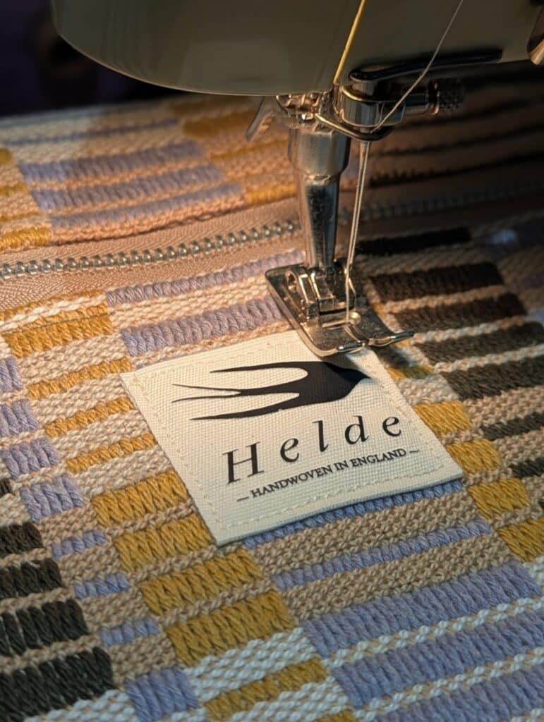 100% cotton label with Helde Handweaving Studio branding
