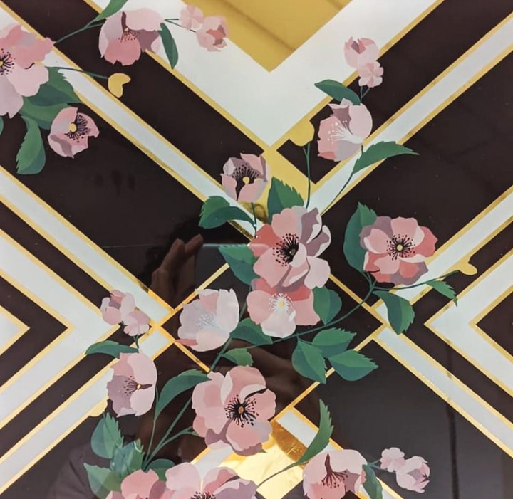 Reverse painting on glass using enamel and 22ct gold leaf