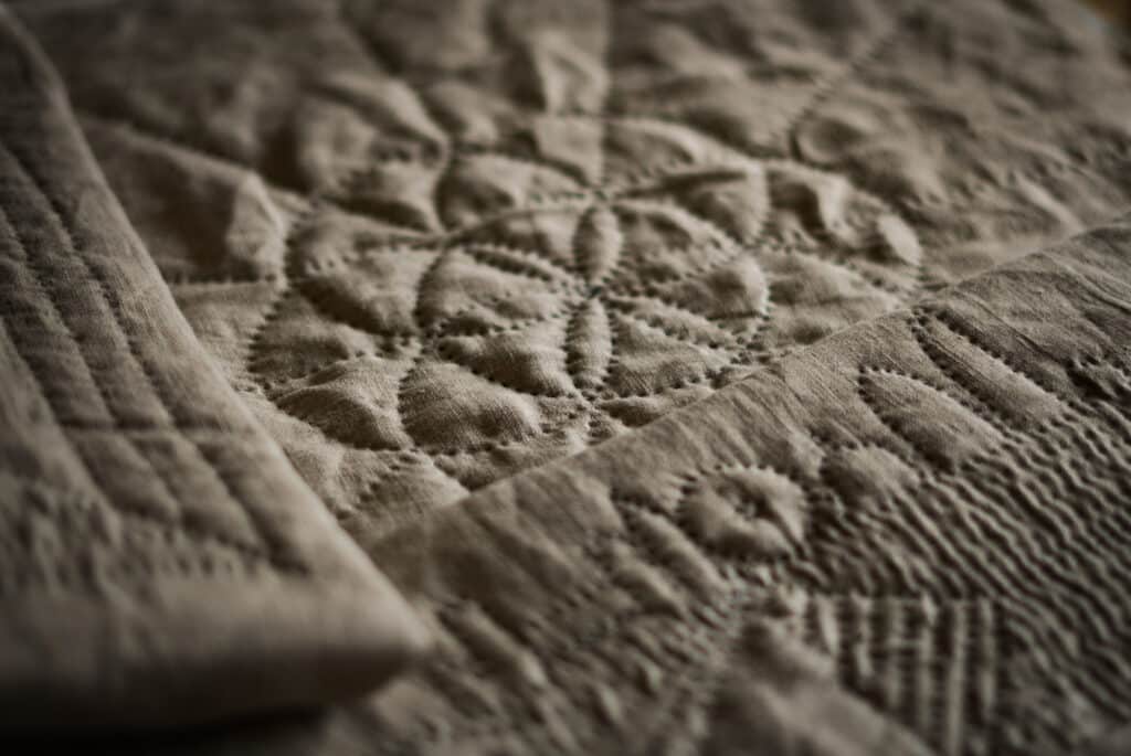 Hand quilted designs, quilted with a rocking stitch