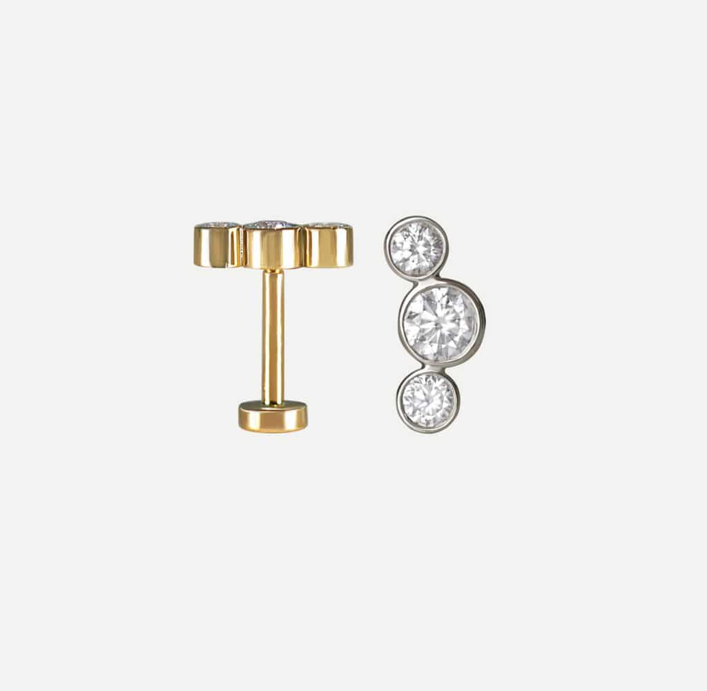 Natural diamond flat-back stud earrings in 18K solid gold. Handcrafted minimalist piercing jewellery by Lena Cohen Jewellery London.