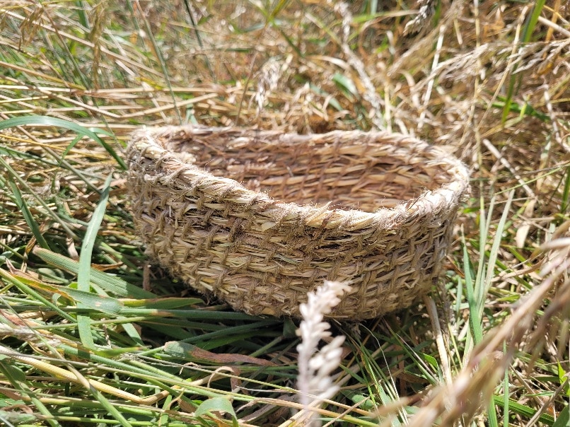Pot made from leftover hay harvest and string