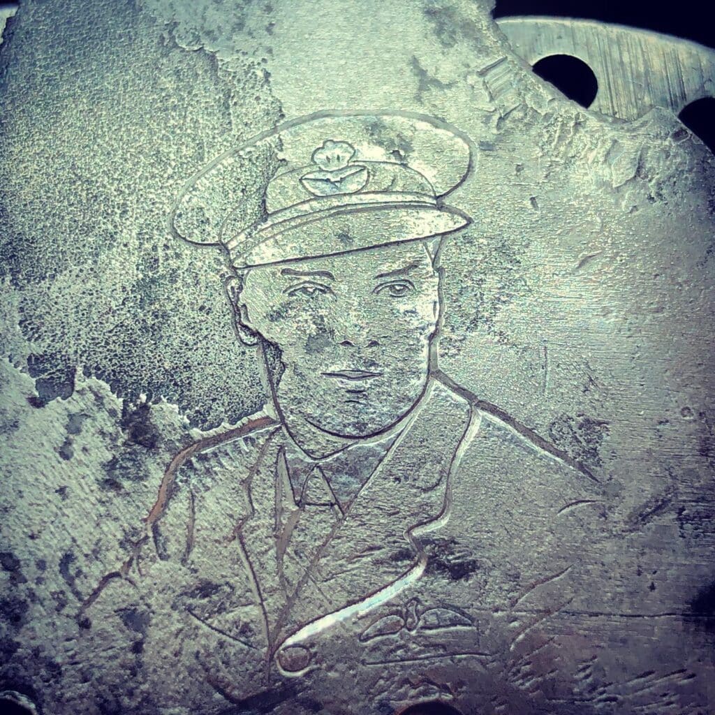 The pilot engraved on a fragment of the plane he flew