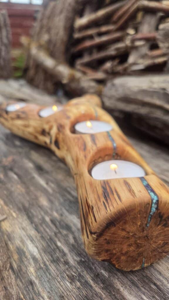 Tealight holder with cornish & mexican turquoise and sugilite filled cracks.