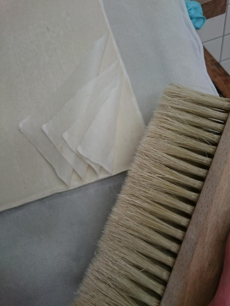 Separation of paper sheets for drying